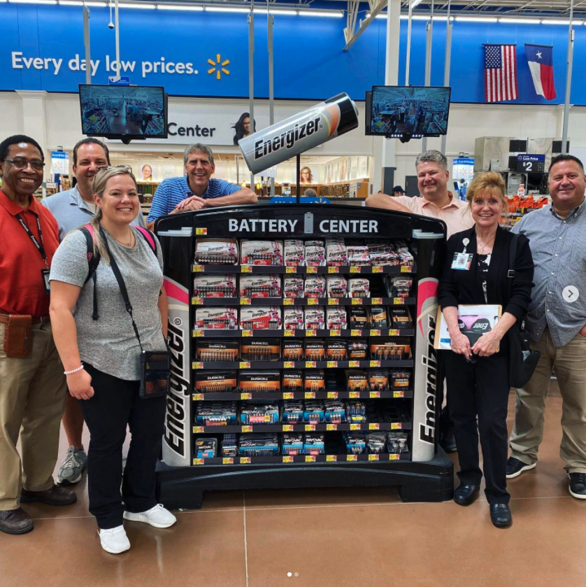 Premium employees with a Walmart display