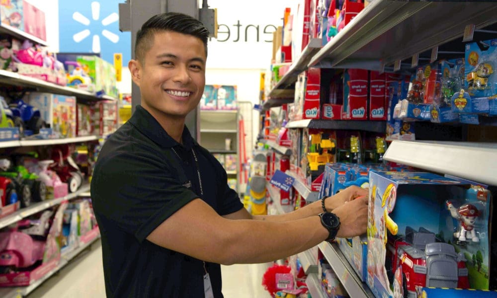 Walmart rep stocking shelves